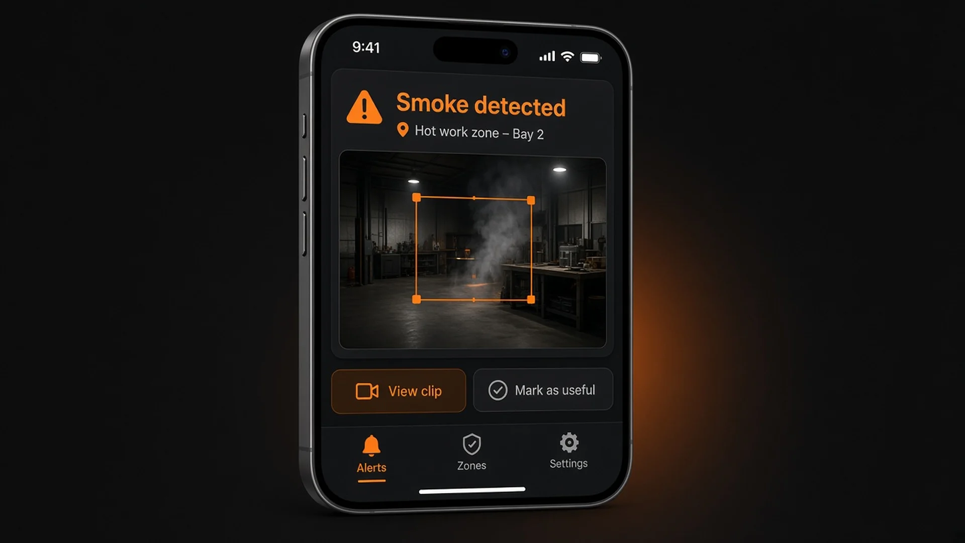 Illustrative app mock-up of a smoke alert for a hot work zone, with a clip thumbnail, a detection box and buttons to view the clip or mark it as useful